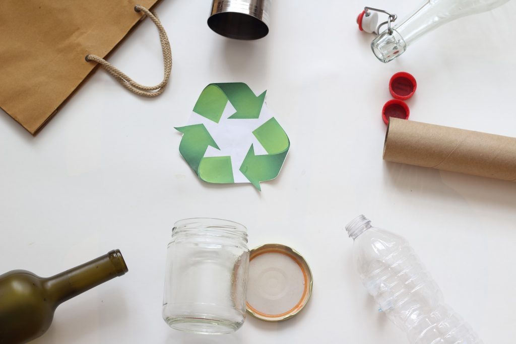 Recycling materials on white background - what is ecopreneurship